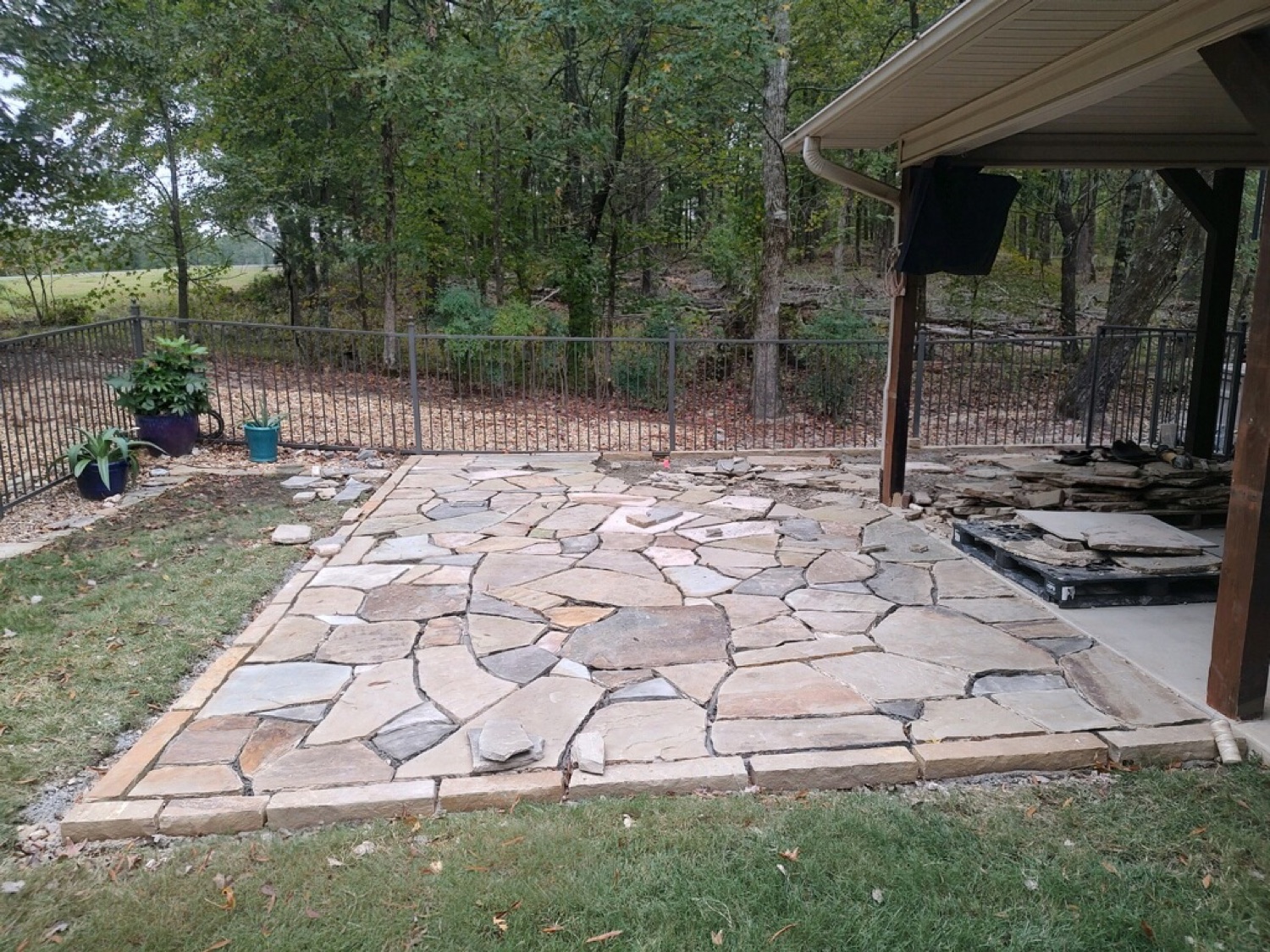 Flagstone patio under a covered porch
