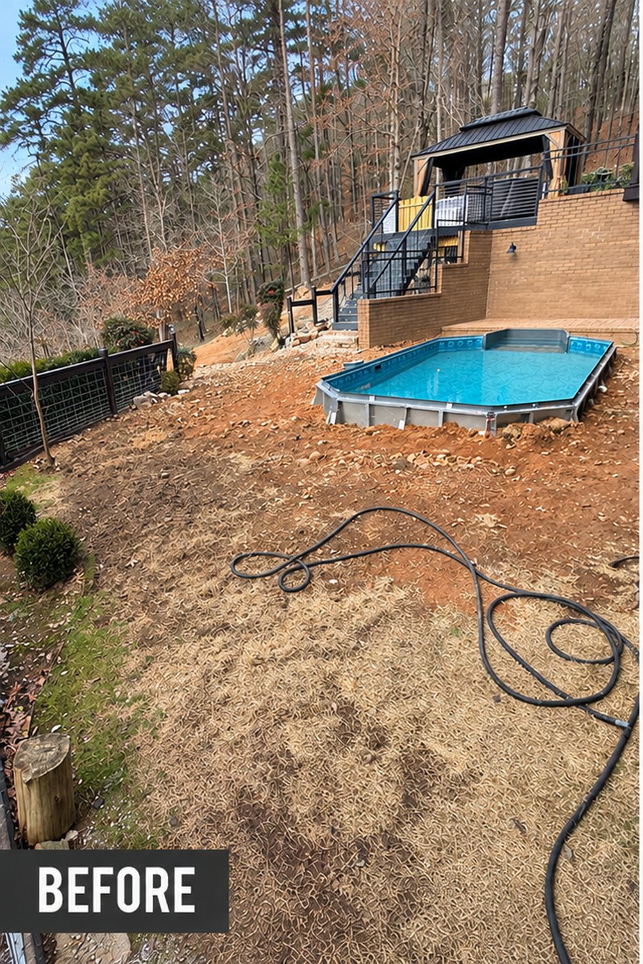 Backyard before — bare dirt slope with an above-ground pool