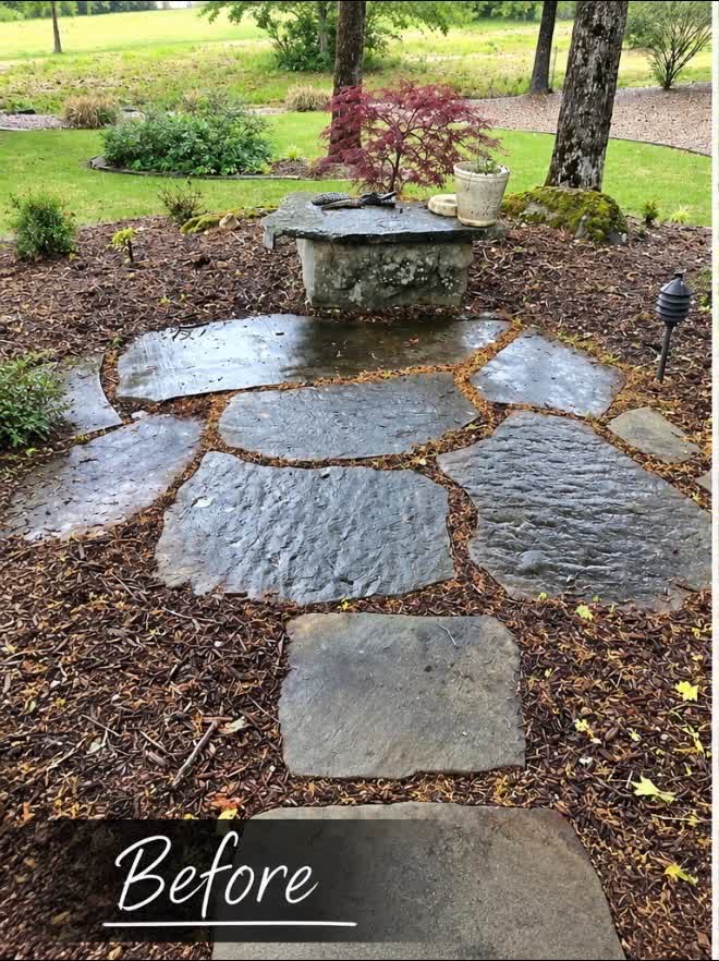 Before β a bare stone table slab in a plain mulch bed